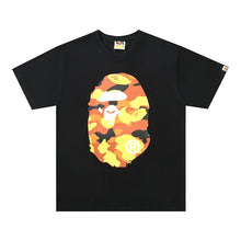 Load image into Gallery viewer, BAPE classic ape-man Japanese fashion brand new orange double-sided camouflage big flower seamless cylinder loose short-sleeved T-shirt male
