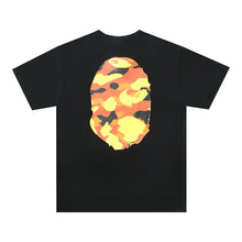 Load image into Gallery viewer, BAPE classic ape-man Japanese fashion brand new orange double-sided camouflage big flower seamless cylinder loose short-sleeved T-shirt male
