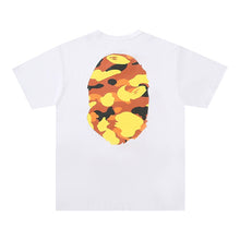 Load image into Gallery viewer, BAPE classic ape-man Japanese fashion brand new orange double-sided camouflage big flower seamless cylinder loose short-sleeved T-shirt male
